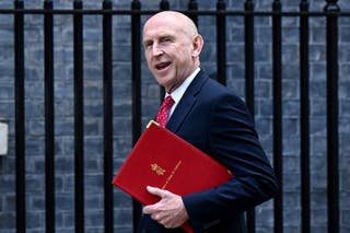 Secretary of state for defence, John Healey, arrives for a weekly cabinet meeting at 10 Downing Street on 15 July 2025 in London, England
